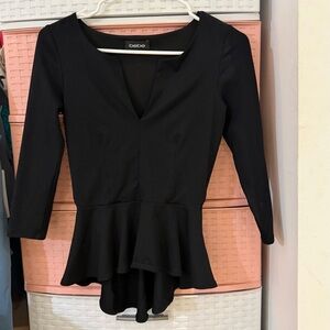 Bebe Top. Color black. Size XS.